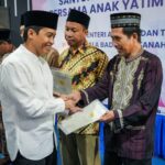 Raja Juli Antoni saat memberikan sambutan pada penyerahan sertipikat tersebut, NU dan Muhammadiyah telah memberikan kontribusi.